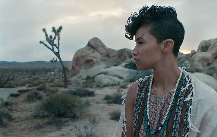 desert Woman looking to the side in desert